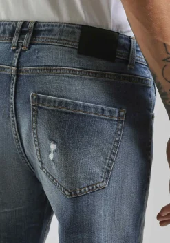 Jeans skinny fit con strappi