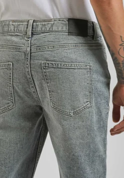 Jeans skinny fit con strappi