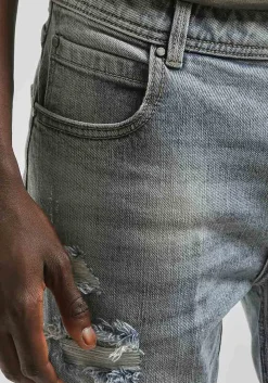Jeans skinny fit con strappi