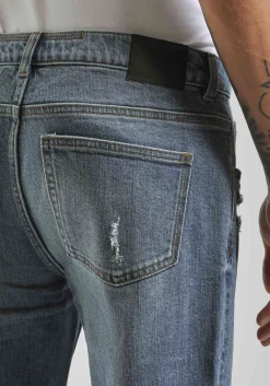 Jeans skinny fit con strappi