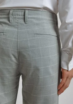 Pantaloni chino con fantasia a quadri