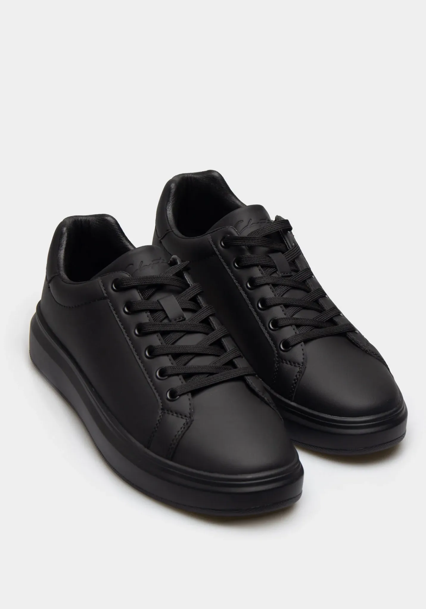 Sneakers effetto pelle