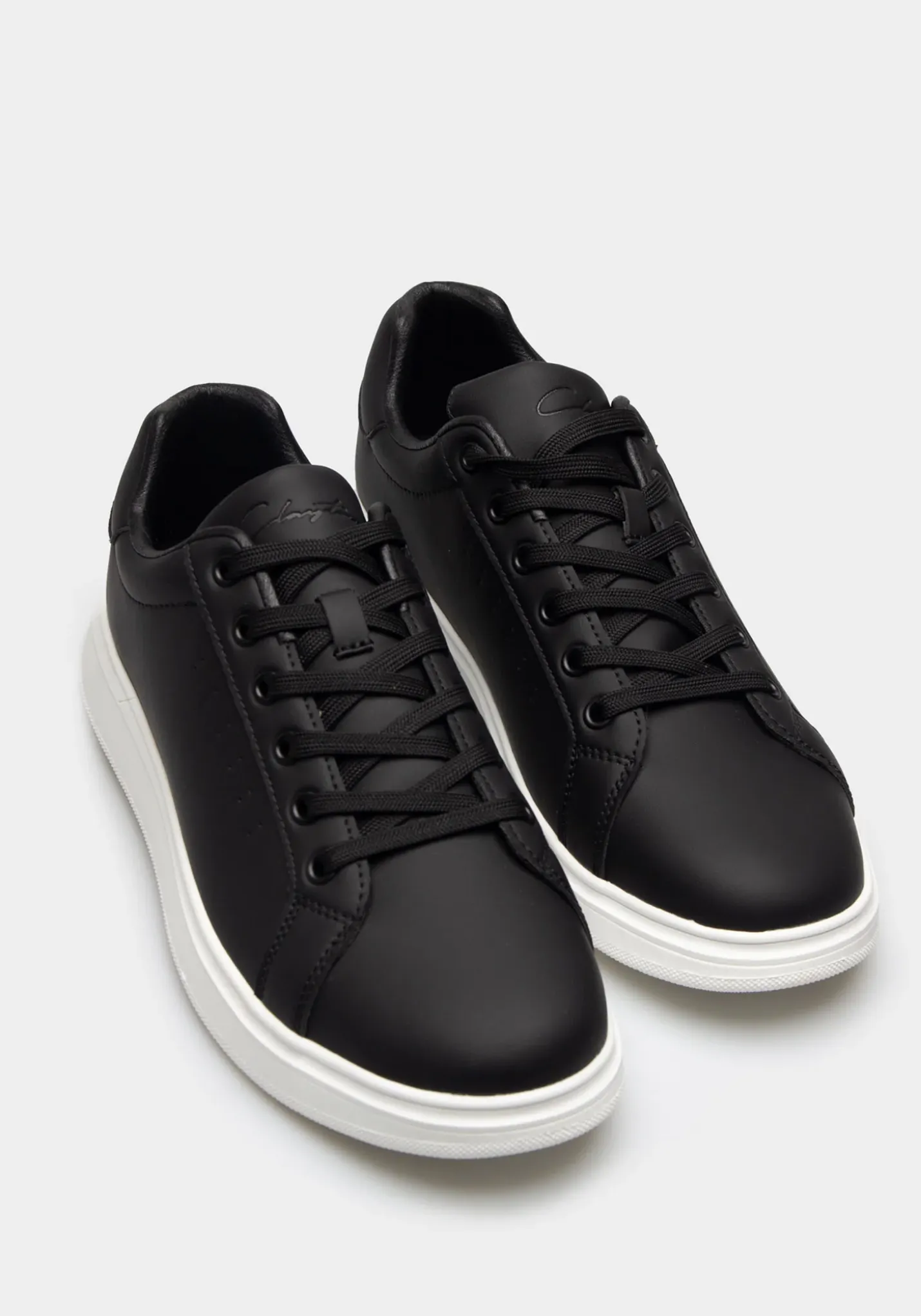 Sneakers effetto pelle