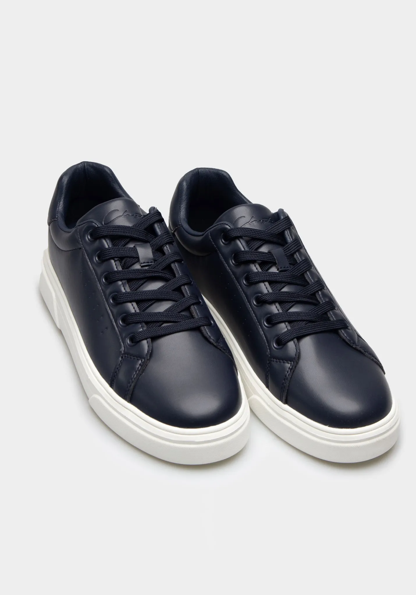 Sneakers effetto pelle