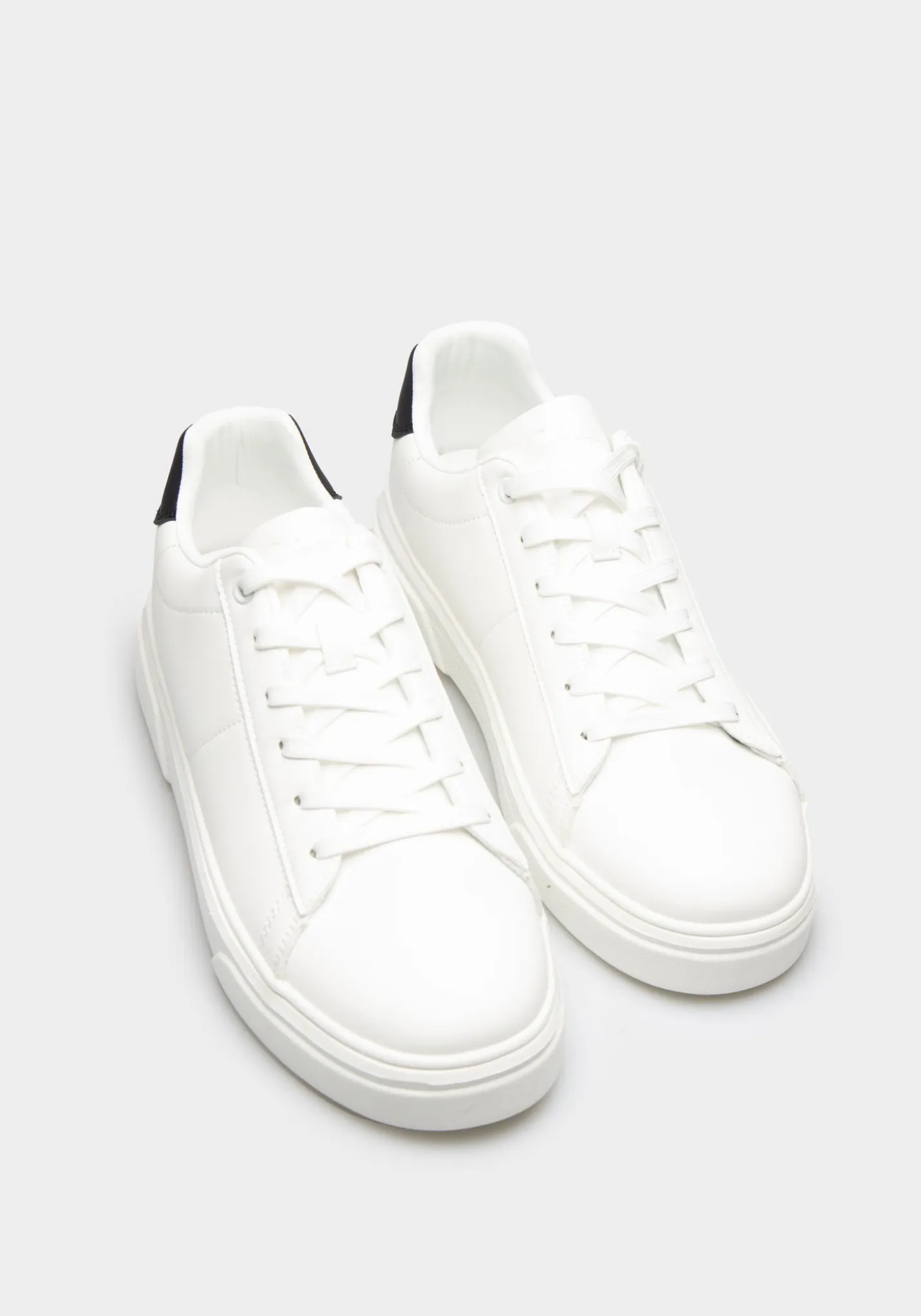 Sneakers effetto pelle