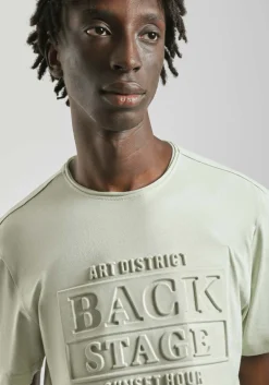 T-shirt con stampa a rilievo